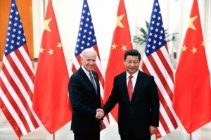 Chinese President Xi Jinping (R) shakes hands with U.S. Vice President Joe Biden (L) inside the Great Hall of the People in Beijing on December 4, 2013. Lintao Zhang/AFP/Getty Images