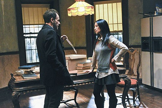 Lucy Liu with Jonny Lee Miller in Elementary.